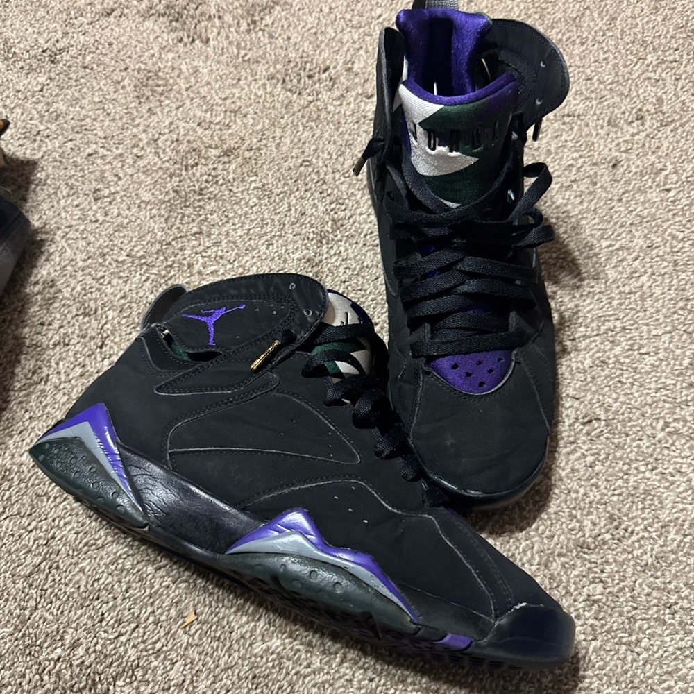 Jordan Black and Purple Athletic Shoes with Geometric Patterns